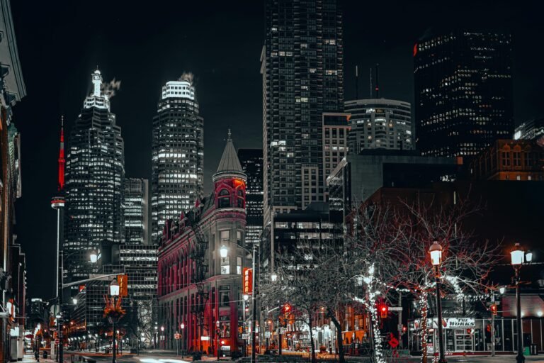 Downtown Toronto street life at night showing the city’s urban atmosphere across seasons