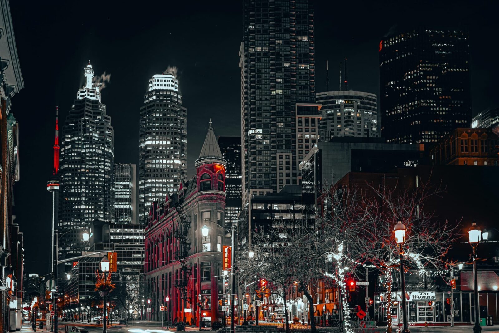 Downtown Toronto street life at night showing the city’s urban atmosphere across seasons