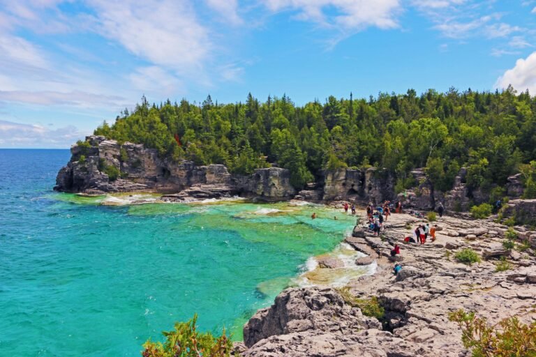 Limestone cliffs and clear water representing Ontario day trips from Toronto