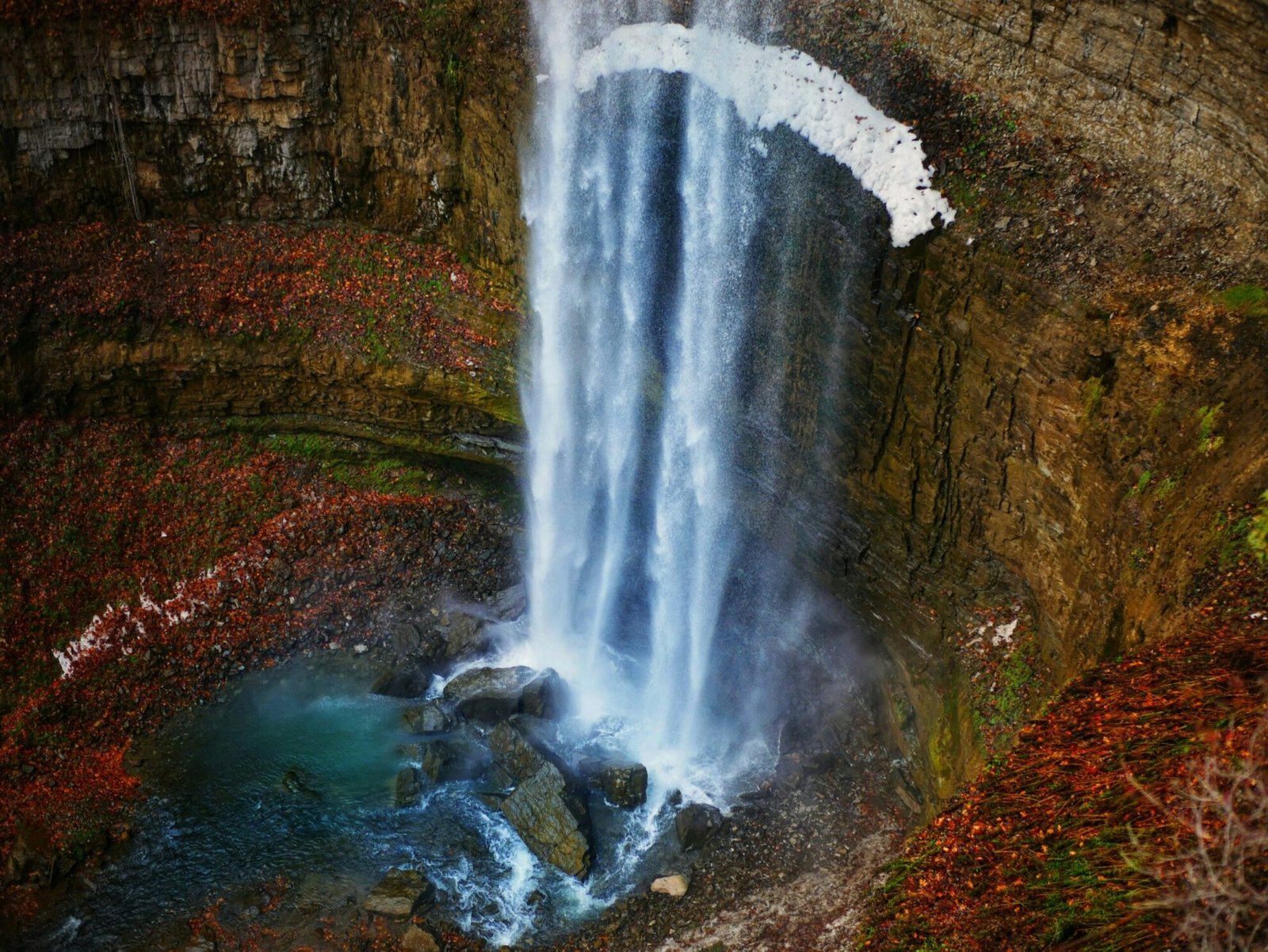 Tews Falls in Hamilton along the Niagara Escarpment surrounded by autumn foliage