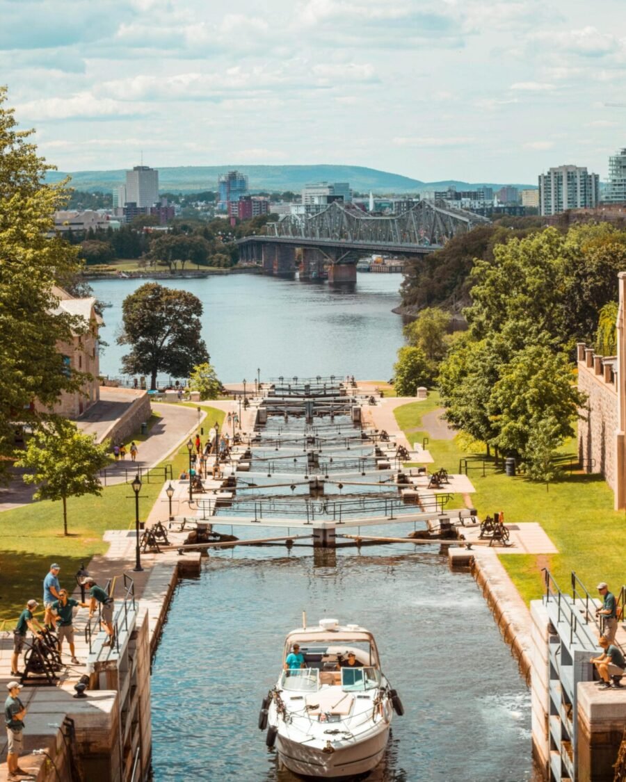 Boat passing through Rideau Canal locks in Ottawa